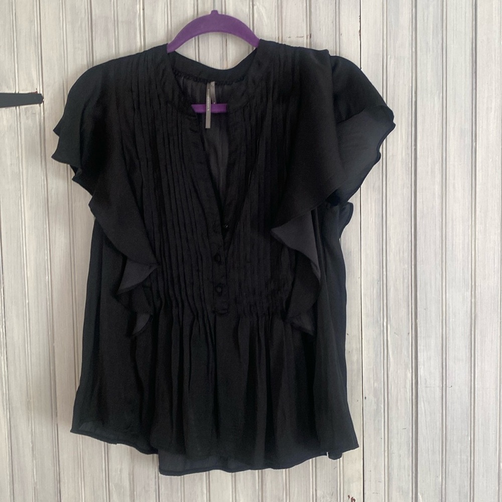 Anthropologie black silk blouse. Never worn.